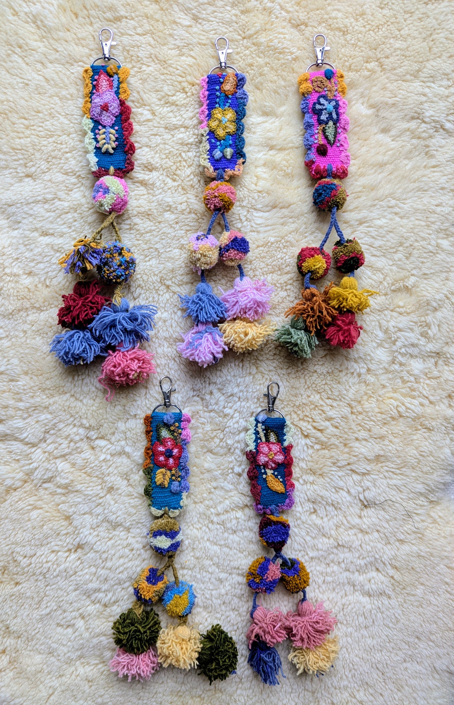 Taschenanhänger-Pompons